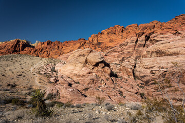 Hiking through Red Rock in Nevada with blue sky