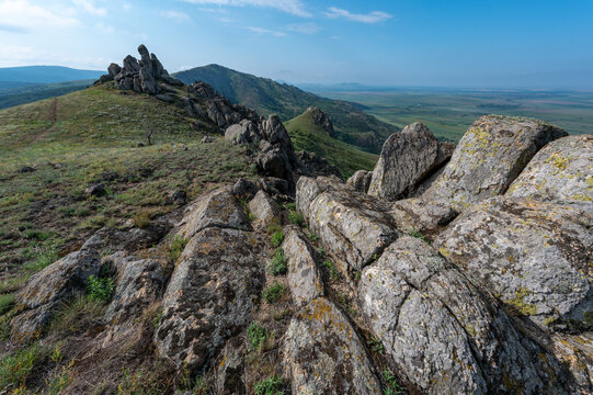 Sunrise in romanian national park mountains munti macin above danube rocks and green meadows