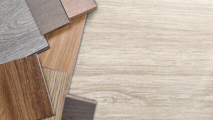 samples of interior material, wood, on wooden table with blank space. interior design selected material including various type of engineering and vinyl flooring tiles for construction. mood board.