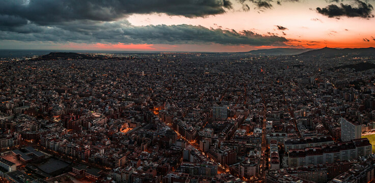 Fototapeta Barcelona street aerial view with beautiful patterns in Spain. Barcelona sunset skyline aerial view with buildings in Spain. Magical sunset over Barcelona.