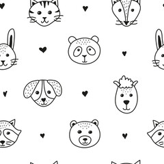 Seamless pattern with doodle animal faces