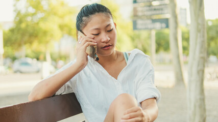 Close-up of young woman talking on cell phone