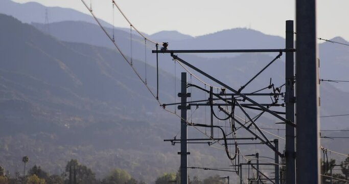 Overhead Train Electrical Wires With Hills