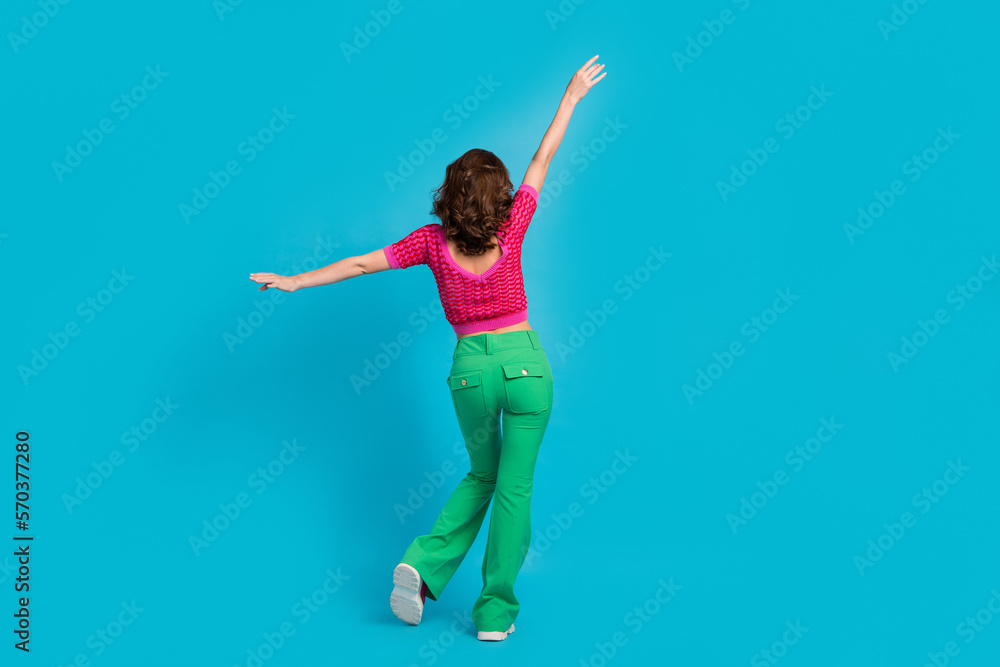 Sticker Full length photo of slim adorable nice lady wear trendy pink clothes rejoice shopping sale empty space isolated on blue color background