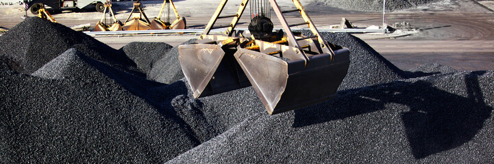 Heaps of coal in the cargo port