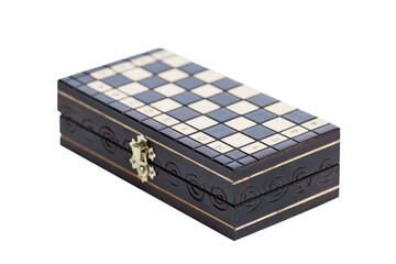 Closed gift box with chess. Intellectual game and sport. Isolated on white background. Close-up.