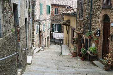 Alley in the ancient village of Chiusdino, Tuscany, Italy