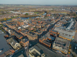 Obraz premium Castleford, West Yorkshire, England. Aerial view of Castleford, mining town known for it's Ski centre and retail outlet, Rugby team and roman settlement alongside the river Are. 