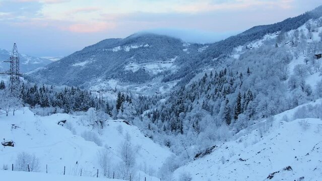 Winter landscape on sunrise in Adjara, caucasus mountains.Route to ski resort Goderdzi. Nature and river in Adjara mountains. Hiking routes and winter holiday destination in Georgia