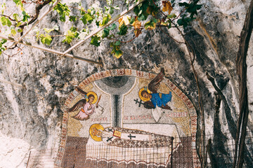 Mosaic with the image of St. Basil and the angels above him in the Ostrog monastery. Montenegro