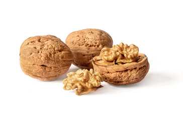 Walnuts peeled and unpeeled in the shell on white isolated background with shadow. Full depth of field