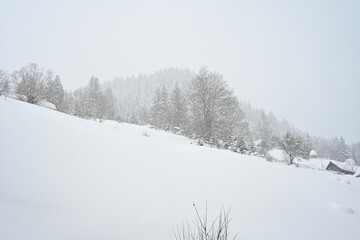 Heavy snow over mountains in winter time