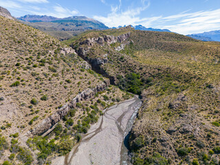 Fototapeta na wymiar Aerial view of a creek running through the gorge of Quebrada El Diablo in Chile - Traveling on the Carretera Austral 