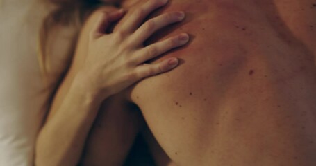 Celebrating sexual pleasure. 4K video footage of a young couple being intimate in bed at home. - Powered by Adobe