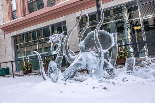 Ottawa, Canada - February 08th 2023: A german photographer discovering the pedestrian zone in downtown Ottawa, viewing ice sculptures of the so called winter lude.