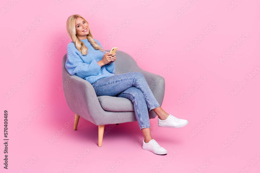 Sticker Full length photo of adorable stunning lady sitting comfort chair use modern device gadget empty space isolated on pink color background