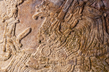 Bas relief carving of mayan ruler king in tombstone, Mexico City, Mexico.