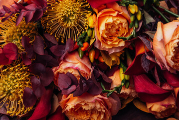 Red pink magenta orange Autumn Colorful fall bouquet. Beautiful flower composition with autumn orange and red flowers. Flower shop and florist design concept. close up, floral background - 570412462
