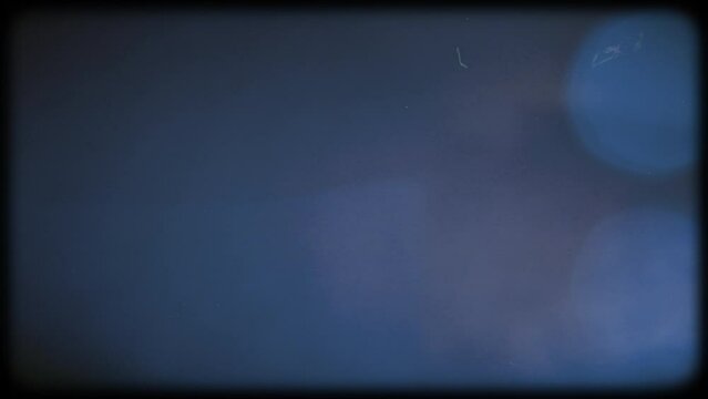 Old vintage film Stock Overlay Frame with Light Leaks, Dust and Scratches Neon Blue