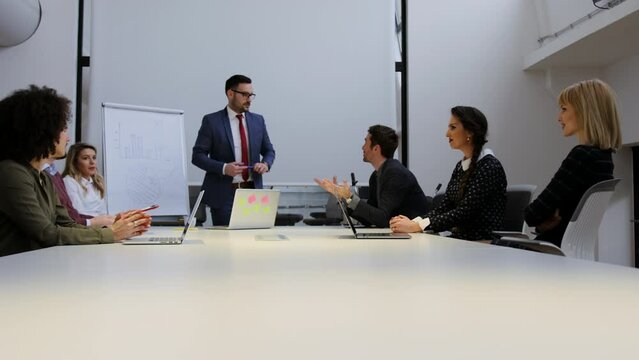 General manager listening to team ideas