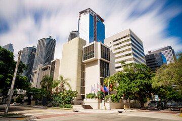 Fototapeta na wymiar Downtown Brickell office buildings. Long exposure photo with cloud motion blur