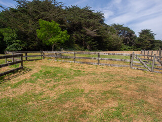 Fototapeta na wymiar Fence Around A Farm Paddock
