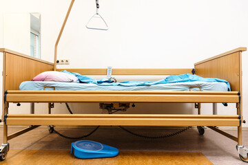 side view of homecare electric hospital bed at home