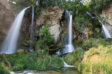 Waterfall with three branches in summer