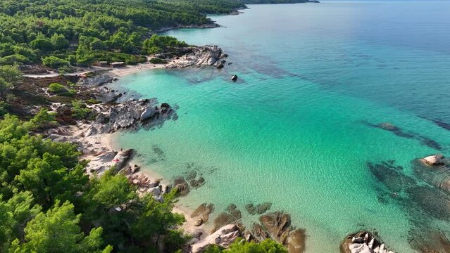Beautiful orange beach Kavourotripes , Sitonia, Halkidiki, Greece. Aerial shot of lagoon with turquoise water, sandy beach and pine trees