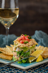 Crab Stack with Corn Chips and Lemon Wedges