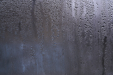 background wet glass with large drops.