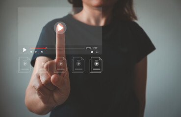Video streaming on internet Concept. Young woman watching online movie or TV series on virtual...