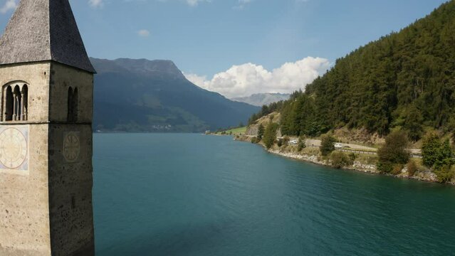 The bell tower in Reschensee - Lake Reschen - South Tyrol, Italy.