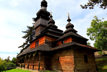 Naklejka premium Old wooden church in Ukraine. Traditional Ukrainian church. Uzhgorod Ukraine
