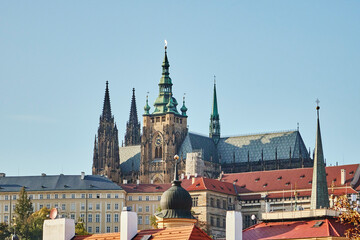 Obraz premium Prague Castle in Czech Republic, main tower with clock and Saint Vitus towers.