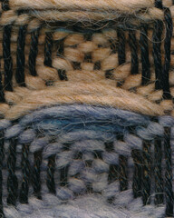Closeup of 3D waffle weave pattern in orange and grey