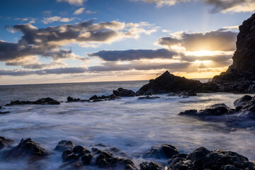 Magic sunrise at Punta de Silva with waves hitting the rocks.