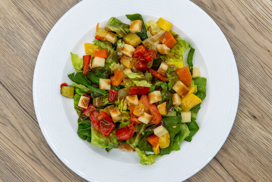 Overhead View Of Tempting Appetizer Of Garden Salad Full Of Winter Vegetables Served Small Plate