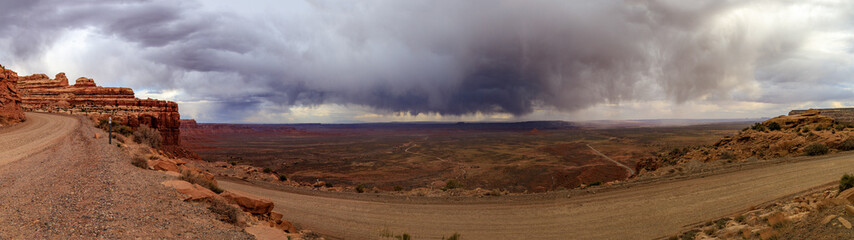 Panorama of dramatic spring storm clouds over a desert valley in Eastern Utah