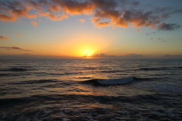 Fototapeta na wymiar Sunrise Over the Atlantic Ocean