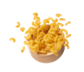 Macaroni fall on wooden bowl, yellow macaronis pasta float explode, abstract cloud fly. Curved macaroni pasta splash throwing in Air. White background Isolated high speed shutter, freeze motion
