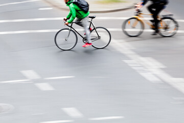 bicycle riders crossing an intersection