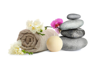 Beautiful composition with rolled towel, flowers and stacked stones on white background. Spa therapy
