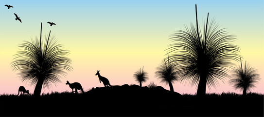 Silhouette of Grass tree and kangaroos with yellow and pink sunset