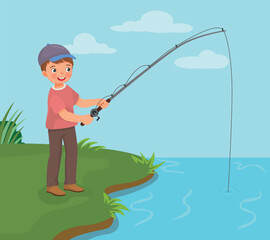 Cute little boy fishing at the river holding a fishing rod