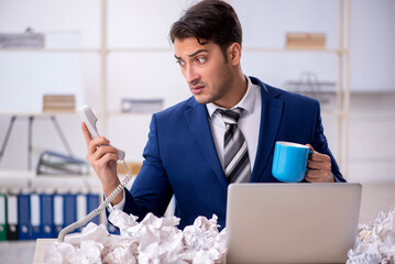 Young male employee in rejected ideas concept