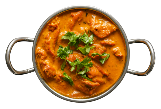 indian butter chicken curry in balti dish top down view and isolated with cilantro garnish