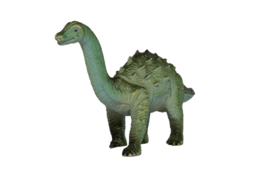 Toy dinosaur. A friendly plastic Diplodocus isolated on a white background.