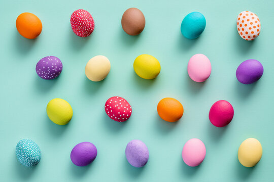 Colorful easter eggs, painted on table top, top view
