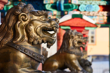 Bronze figures of lions in the Buddhist temple